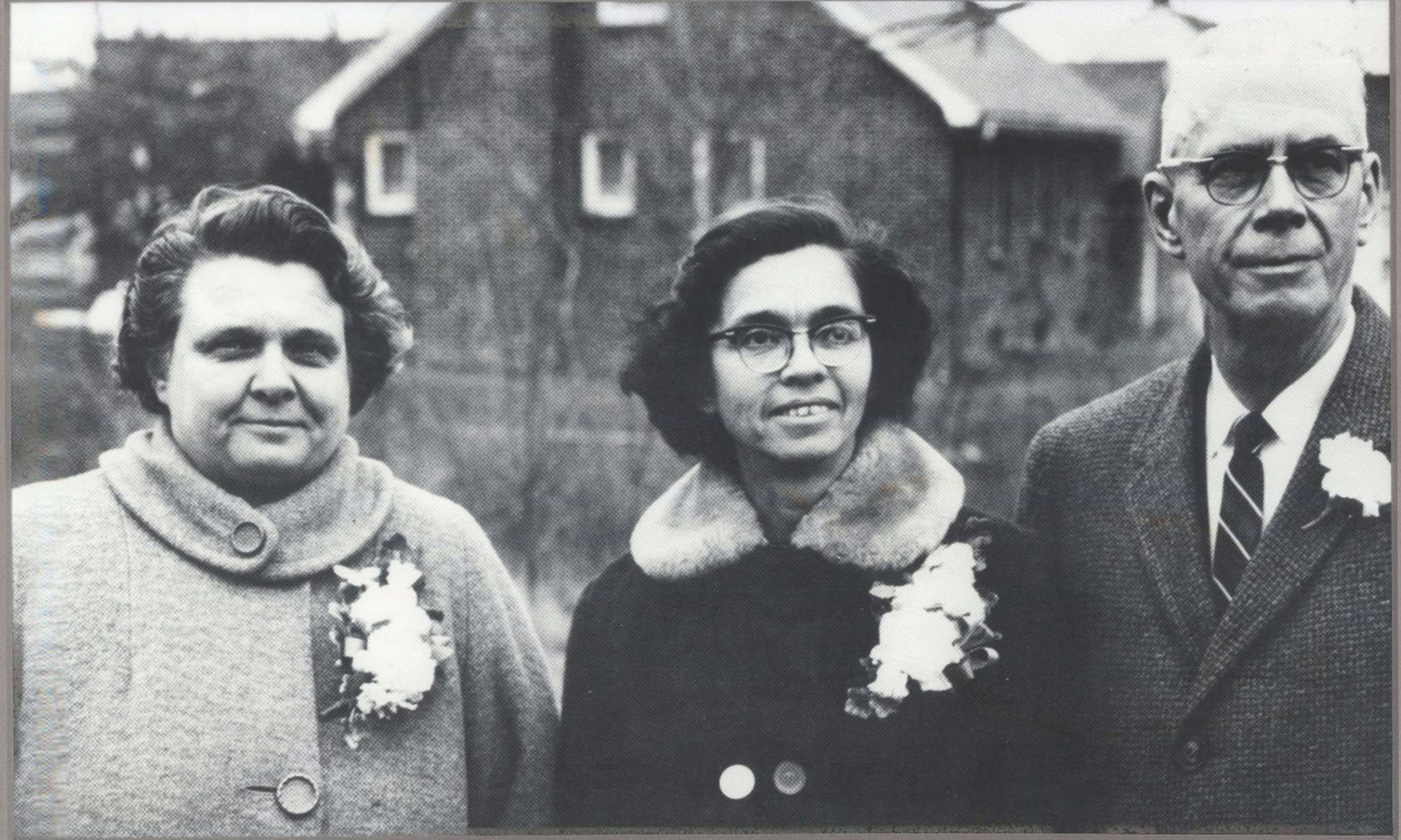 Bethany founders taking a picture in front of the first office.