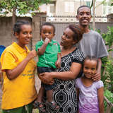 ethiopian family gathers in their yard